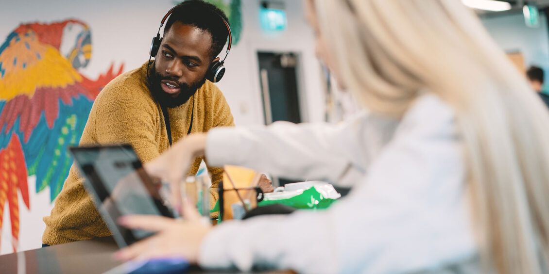 office workers on video calls with headsets